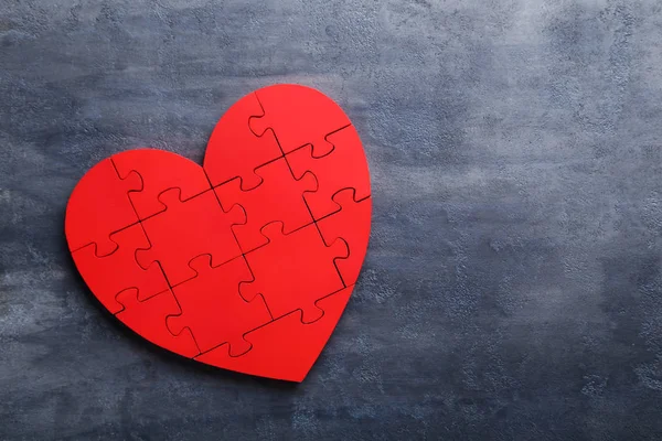 Red puzzle heart — Stock Photo, Image