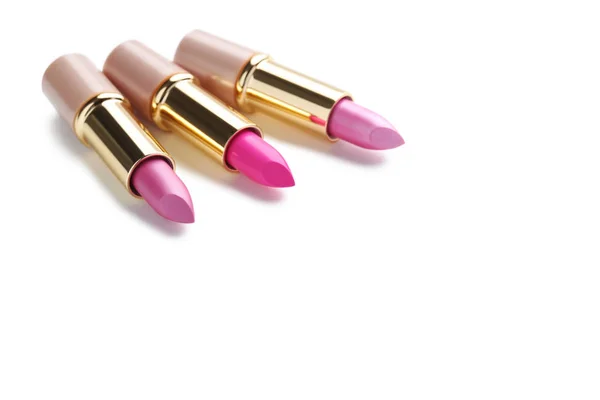 Collectie van roze geopende lippenstiften — Stockfoto