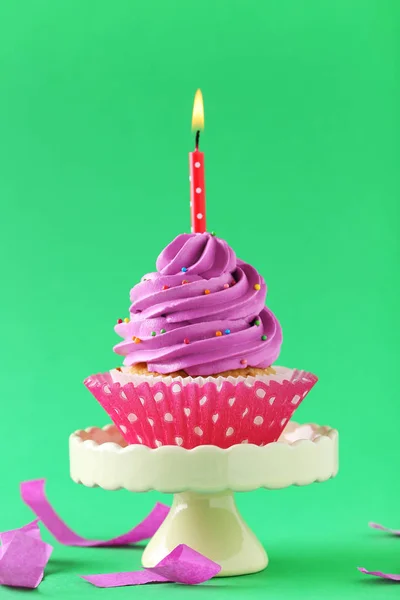 Tasty cupcake with candle — Stock Photo, Image