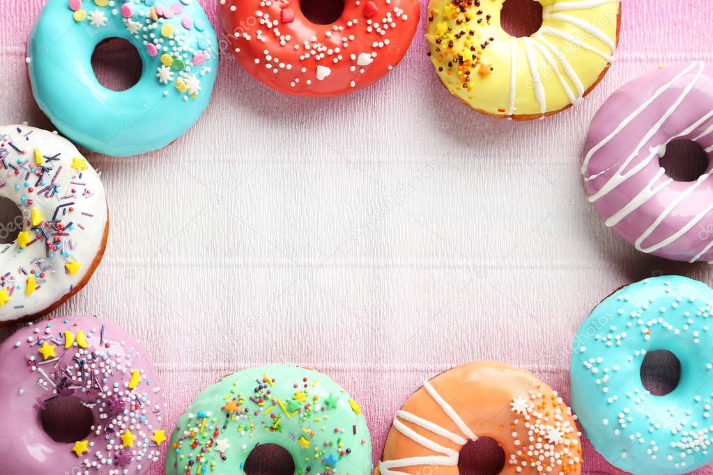 Tasty donuts with sprinkles 