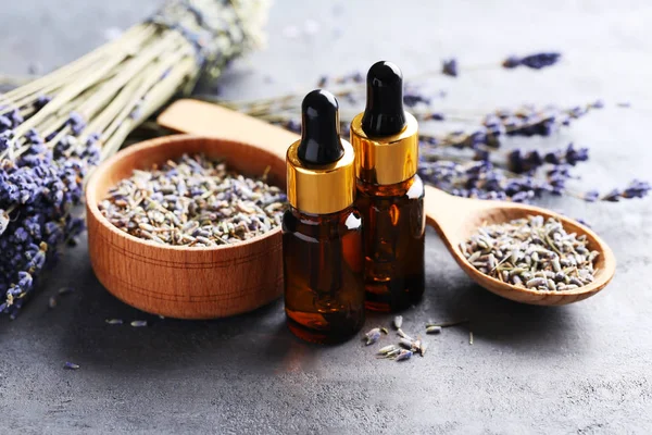 Lavender oil and flowers — Stock Photo, Image