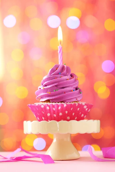 Tasty cupcake on stand — Stock Photo, Image