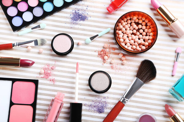 different makeup cosmetics on paper