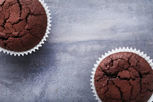 Chocolate muffins on table — Stock Photo, Image