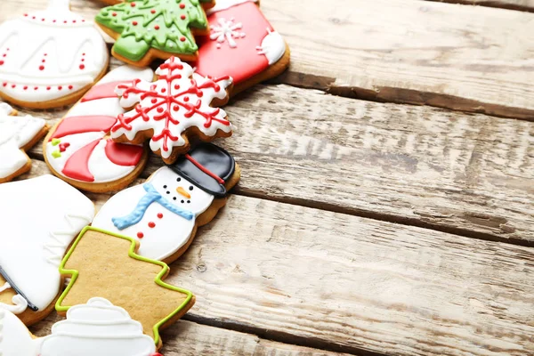 Christmas cookies on a brown wooden table — Stock Photo, Image