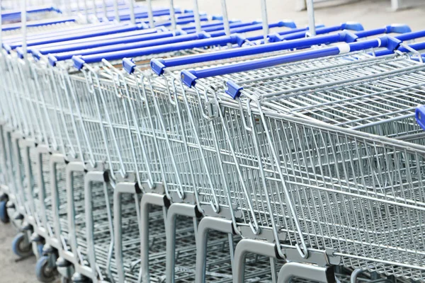 Shopping carts in row — Stock Photo, Image