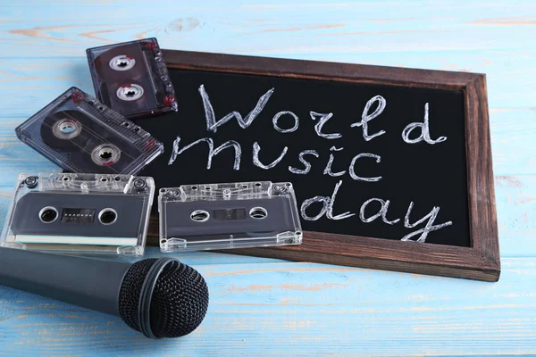 Inscription World Music Day with microphone and cassette tapes o