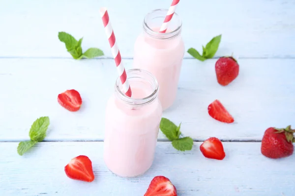 Strawberry yogurt in bottles — Stock Photo, Image