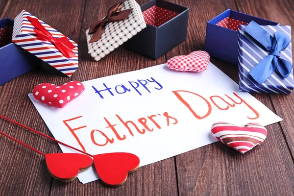 Happy fathers day written on white paper — Stock Photo, Image