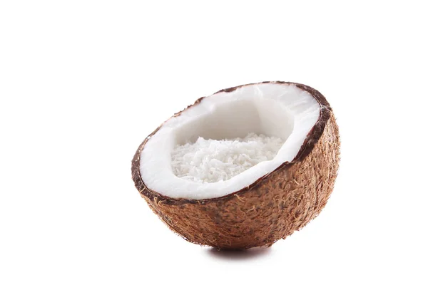Noix de coco avec flocons sur un blanc — Photo