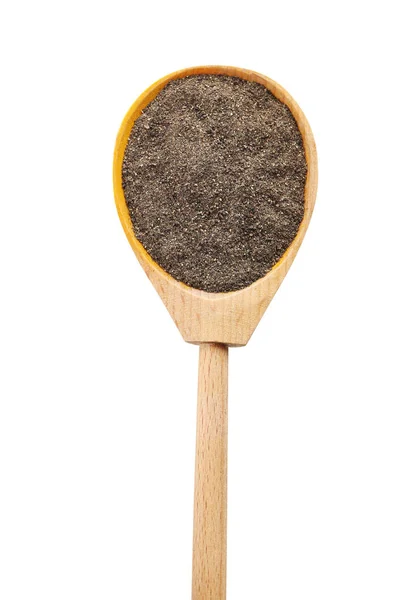 Black ground pepper in wooden spoon — Stock Photo, Image