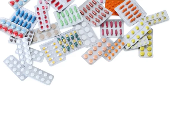 Различные таблетки в пузырьках — стоковое фото