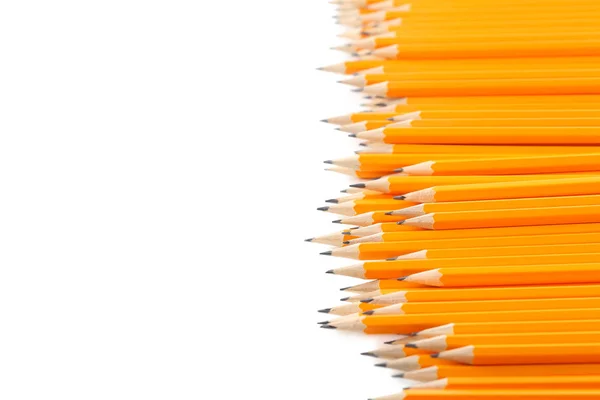 Gelbe Bleistifte auf einem weißen — Stockfoto