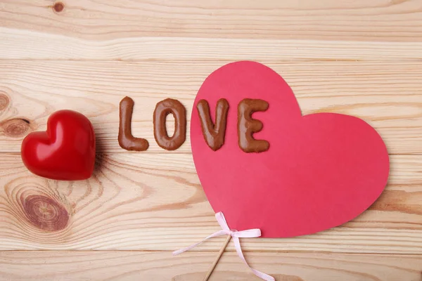 Amor escrito por galletas de chocolate —  Fotos de Stock