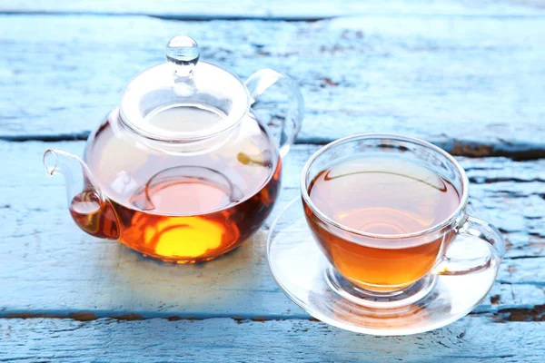 Xícara de chá com bule — Fotografia de Stock