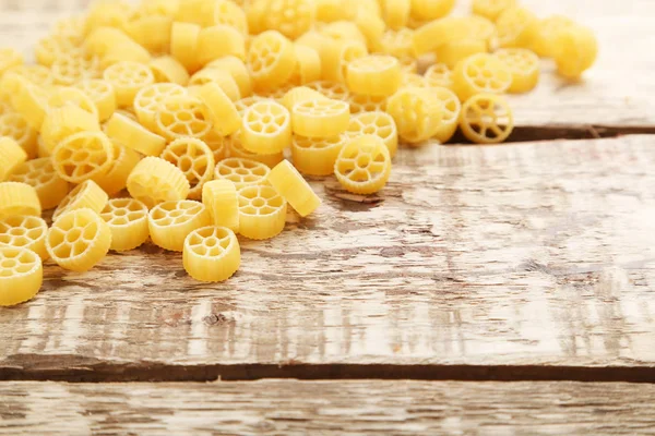 Heap of pasta on table — Stock Photo, Image