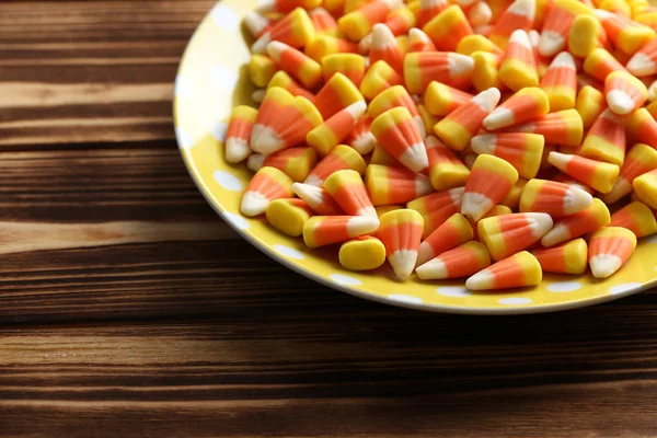 Halloween candy corns in plate — Stock Photo, Image