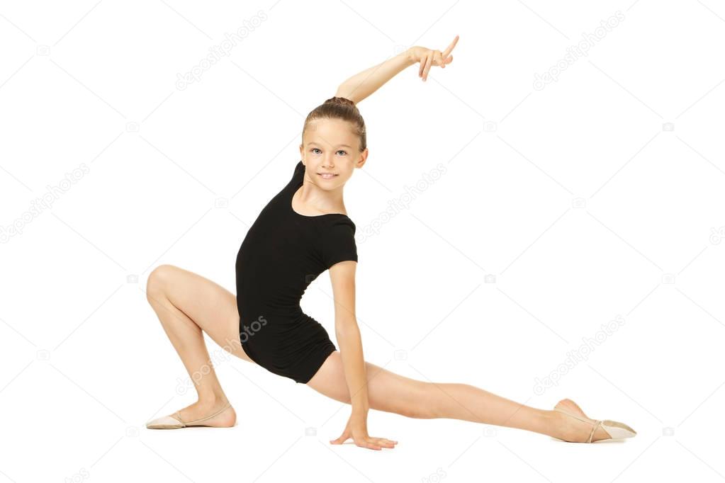 Young girl gymnast on white background