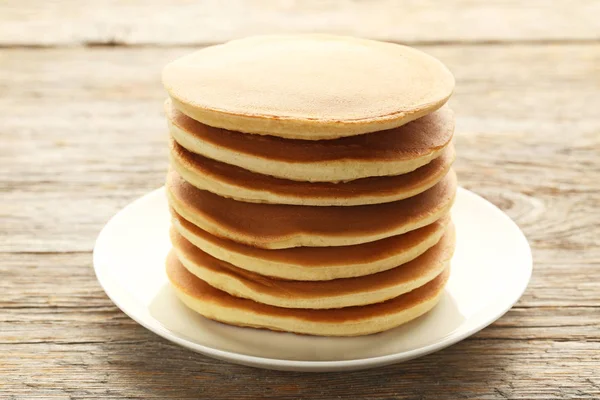 Tasty pancakes in plate — Stock Photo, Image