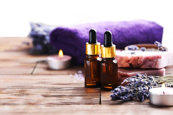 Lavender oil with soap and flowers — Stock Photo, Image