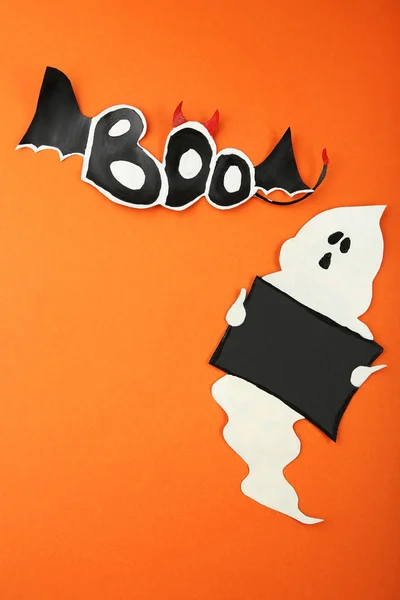 Halloween ghost on orange background — Stock Photo, Image