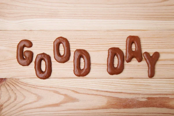 Bom dia escrito por biscoitos de chocolate — Fotografia de Stock