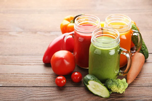 Vegetables smoothie in jars — Stock Photo, Image