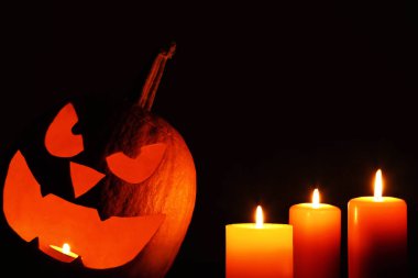 Cadılar Bayramı Balkabağı mumlar ile 