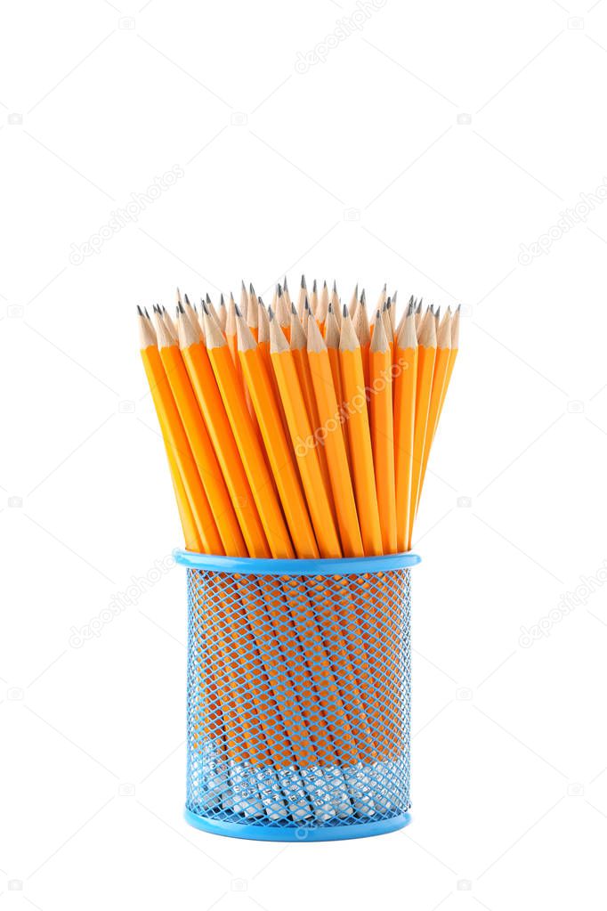 Yellow pencils in metal cup 