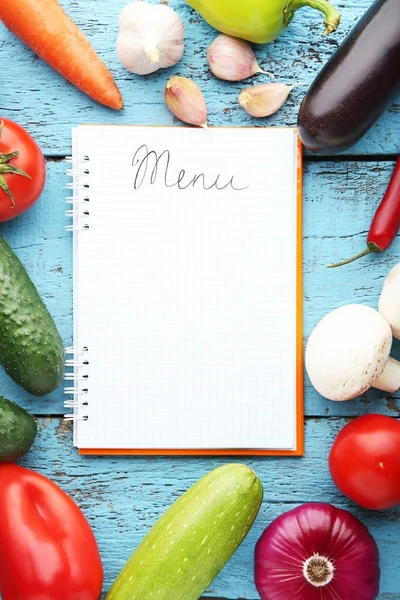 Blank menu book with vegetables — Stock Photo, Image