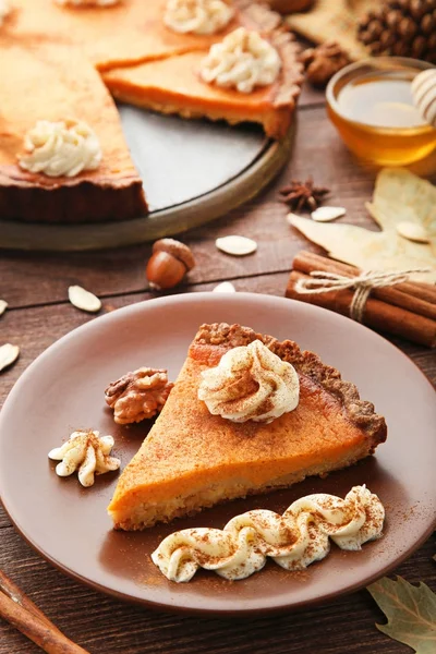 Sweet piece of pumpkin tart in plate — Stock Photo, Image