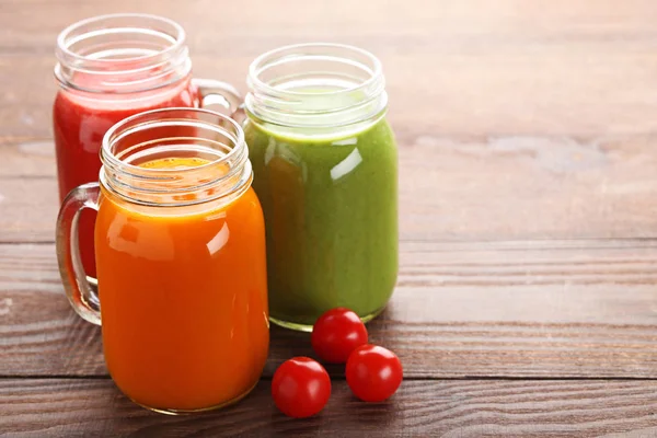 Vegetable smoothie in jars — Stock Photo, Image