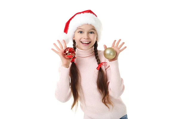 Молода дівчина в капелюсі Санта з вадами на білому тлі — стокове фото