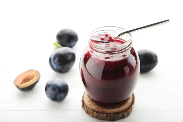 Plum jam in glass jar — Stock Photo, Image