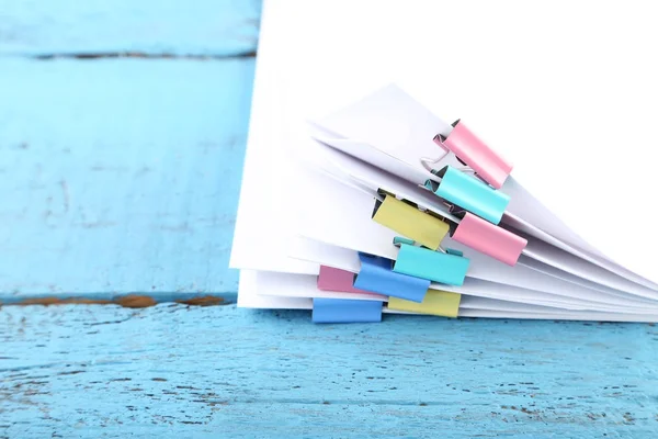 Stack of papers with clamps — Stock Photo, Image