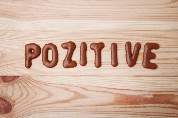 Λέξη Pozitive Γραμμένη Από Μπισκότα Σοκολάτας Αλφάβητο — Φωτογραφία Αρχείου