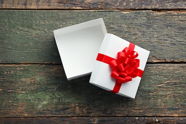 Open gift box with ribbon — Stock Photo, Image