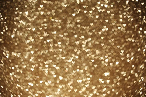 Güzel altın kalp bokeh arka plan