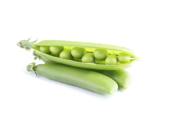 鲜绿色的豌豆 用白色隔开 — 图库照片