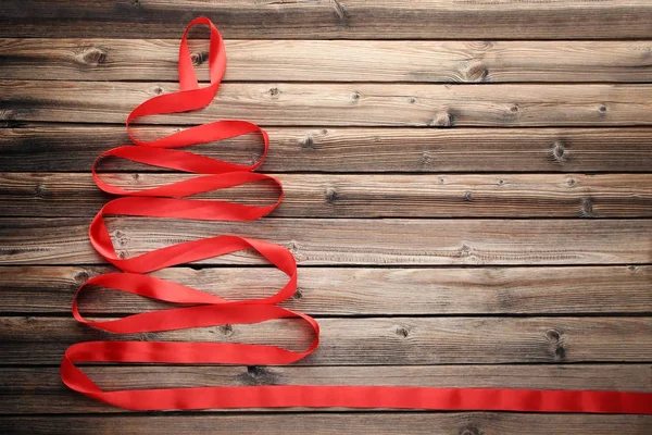 Christmas Tree Made Red Ribbon Wooden Table — Stock Photo, Image