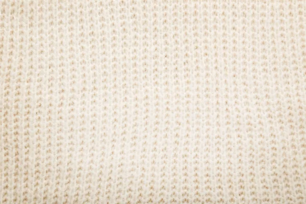 Knitted beige sweater — Stock Photo, Image