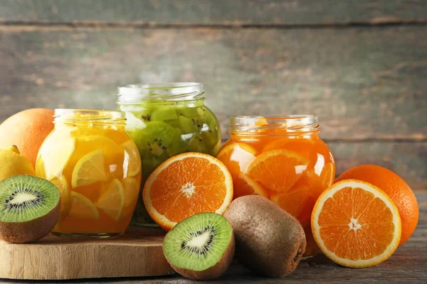 Lemon and orange jam in glass jars