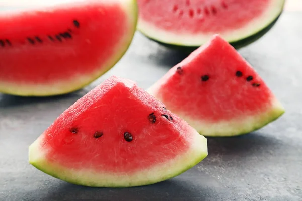 Slices of watermelons on  table — Stock Photo, Image