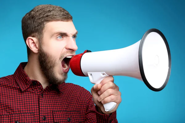 Young Man Screaming Megaphone Blue Background — Stock Photo, Image