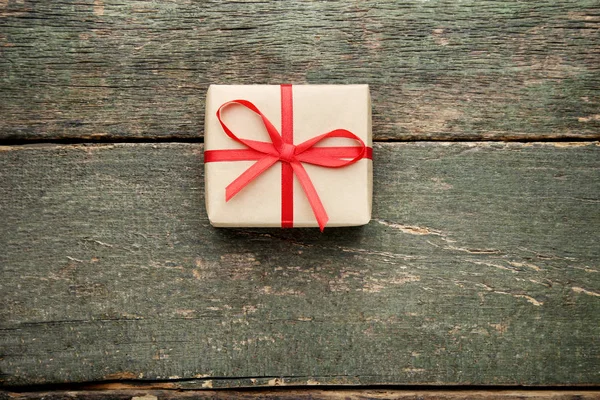 Gift Box Red Ribbon Wooden Table — Stock Photo, Image