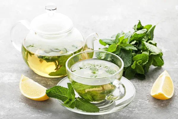 Cup Tea Mint Leafs Lemons Wooden Table — Stock Photo, Image