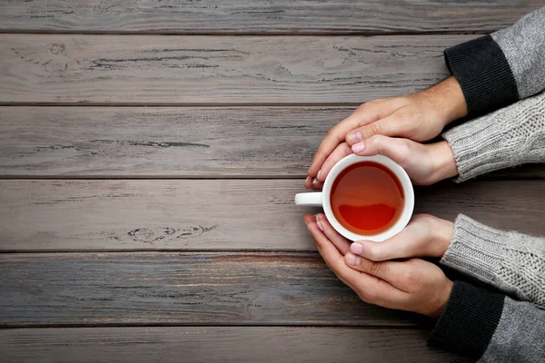 Female Male Hand Holding Cup Tea Wooden Table — Stock Photo, Image