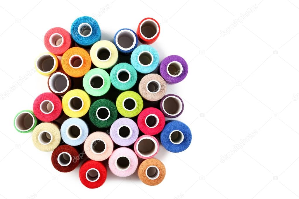 Colourful thread spools isolated on a white