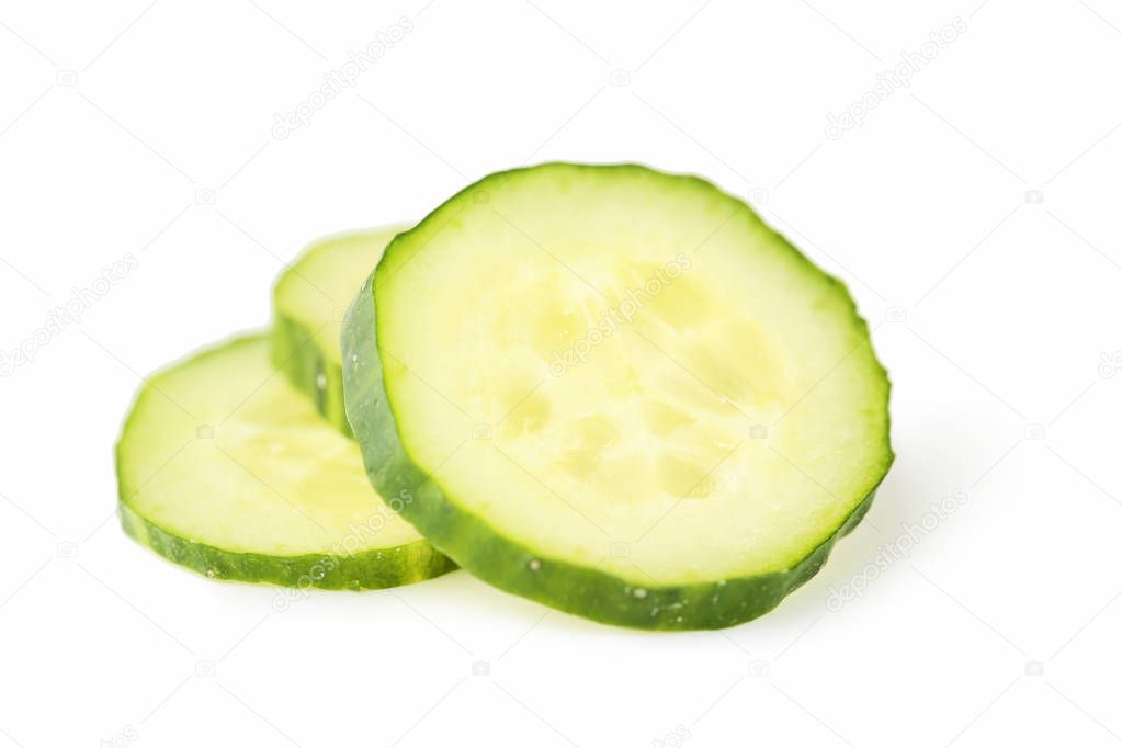 Sliced cucumbers isolated on white background