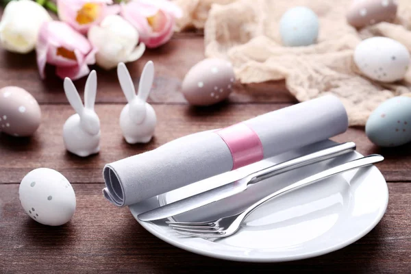 Kitchen cutlery with easter eggs — Stock Photo, Image